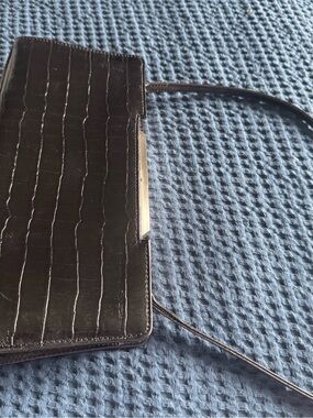 Prague small black leather handbag, convertible